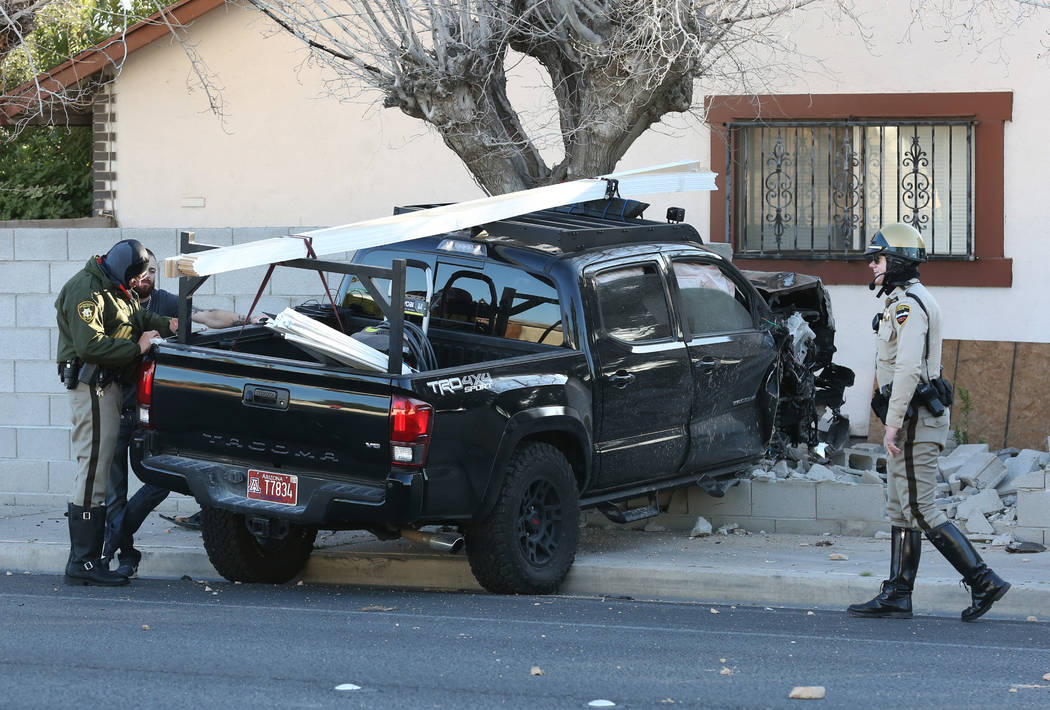 Las Vegas police are investigating after a suspected drunk driver crashed into a wall directly ...