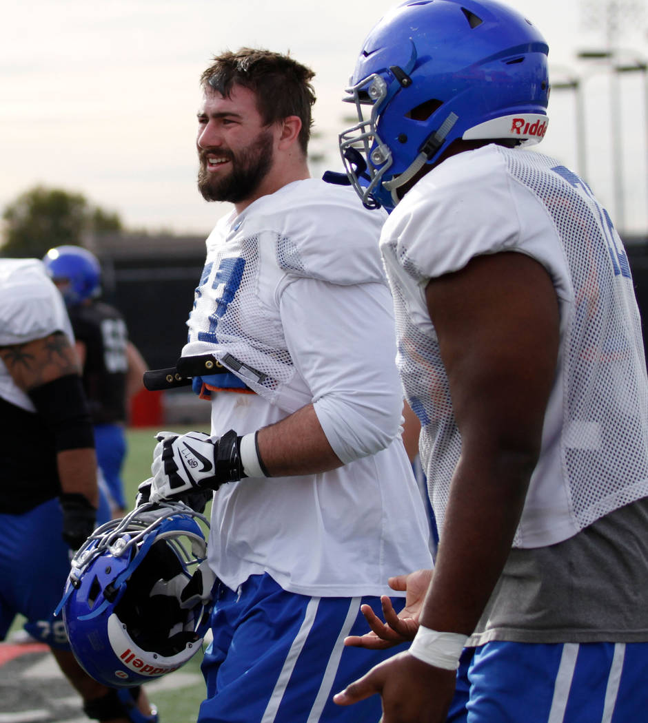 Boise State Broncos offensive lineman John Molchon (77), center, is seen during a football prac ...