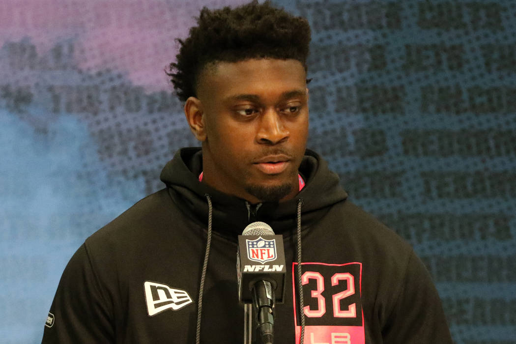 Louisiana State linebacker Patrick Queen takes questions during a news conference at the NFL sc ...