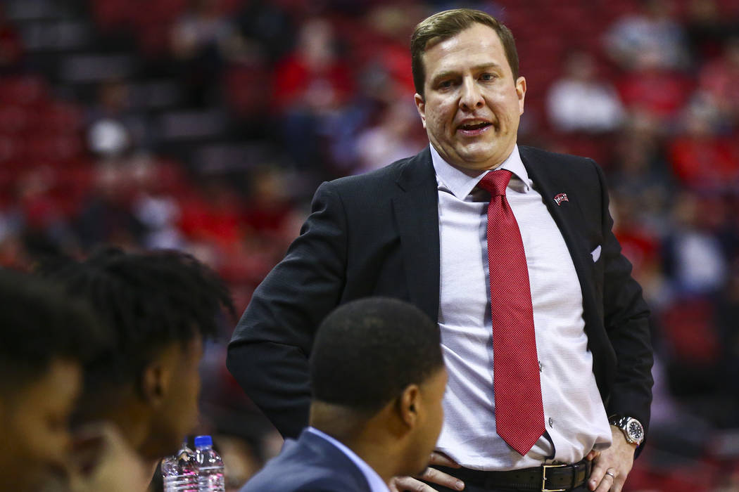 UNLV Rebels head coach T.J. Otzelberger looks on during the second half of a basketball game ag ...