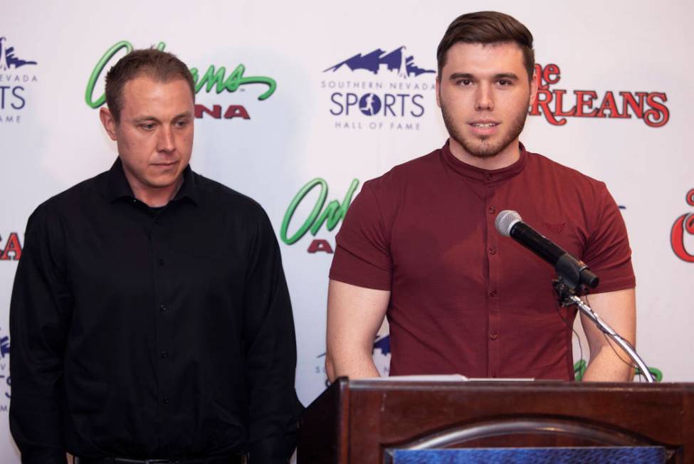 Kelan Gondrezick, left, and Travis Gondrezick, right, thank the Southern Nevada Sports Hall of ...