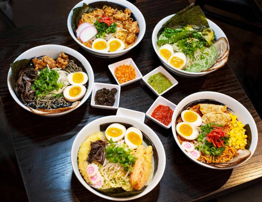 Five bowls of ramen, each accompanied by a different spice mixture (Noah Weller)