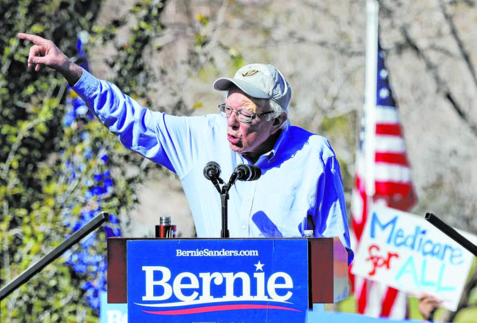 Democratic presidential candidate Sen. Bernie Sanders addresses his supporters at a rally as pa ...