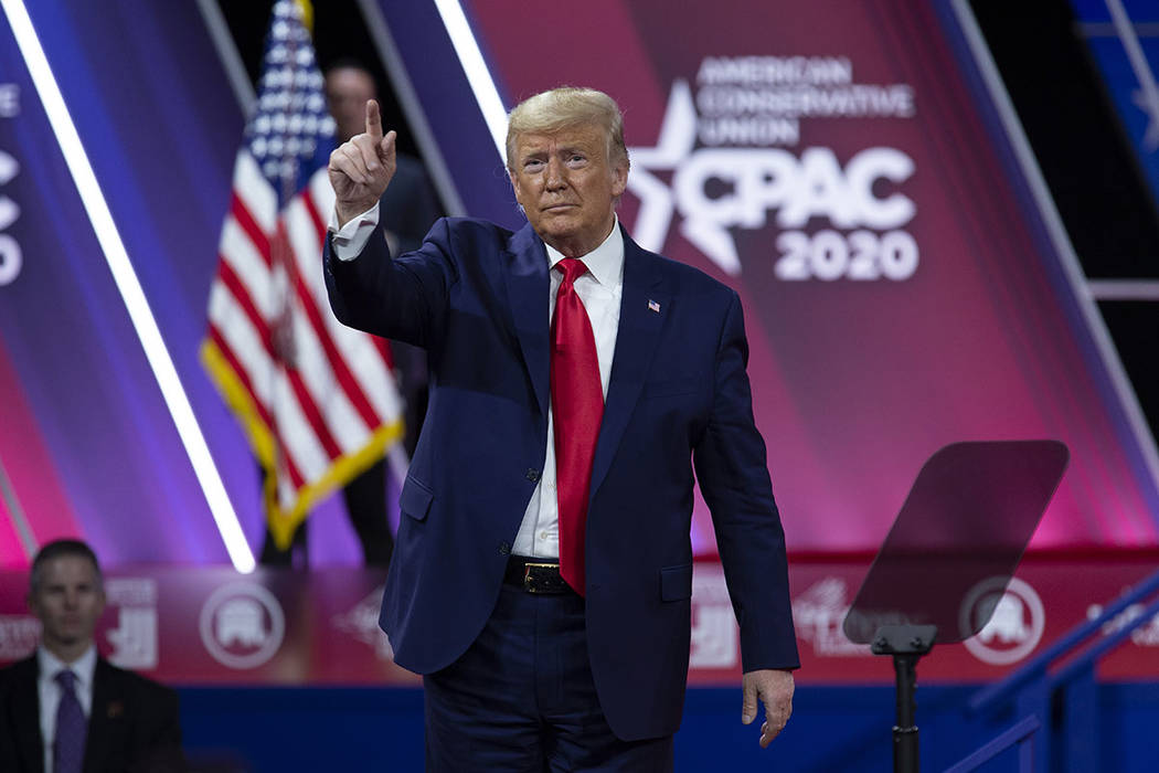 President Donald Trump greets the crowd after speaking at Conservative Political Action Confere ...