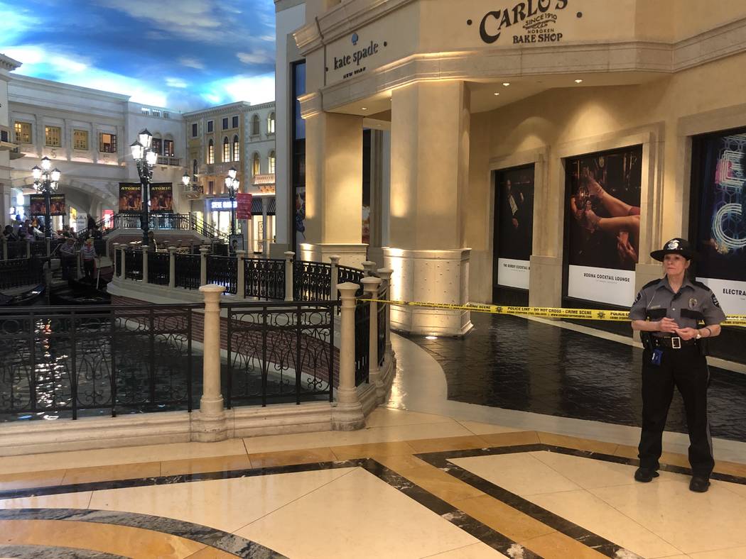 A crime scene in the Grand Canal Shoppes inside the Palazzo Saturday morning. Las Vegas police ...