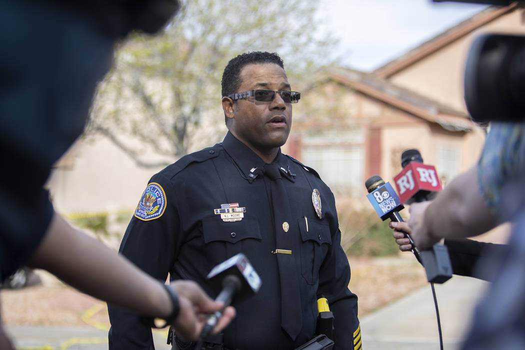 Officer K.L. Moore gives a media briefing about an "officer-involved" shooting that o ...