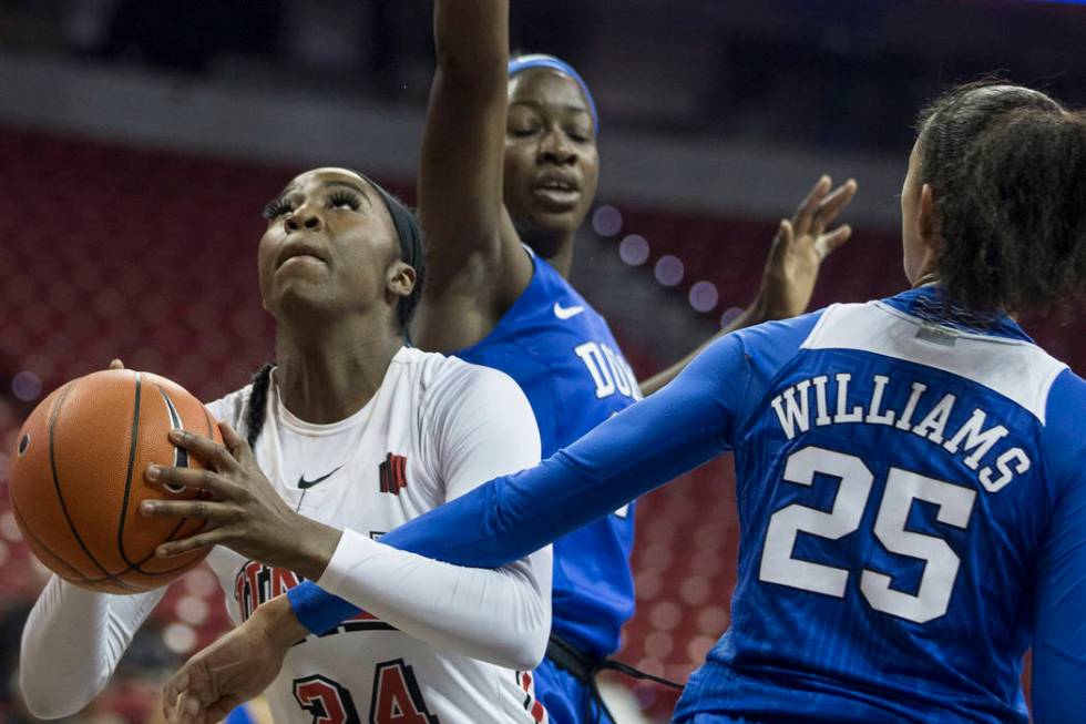 UNLV Lady Rebels guard Rodjanae Wade (24) slices past Duke Blue Devils forward Jade Williams ( ...