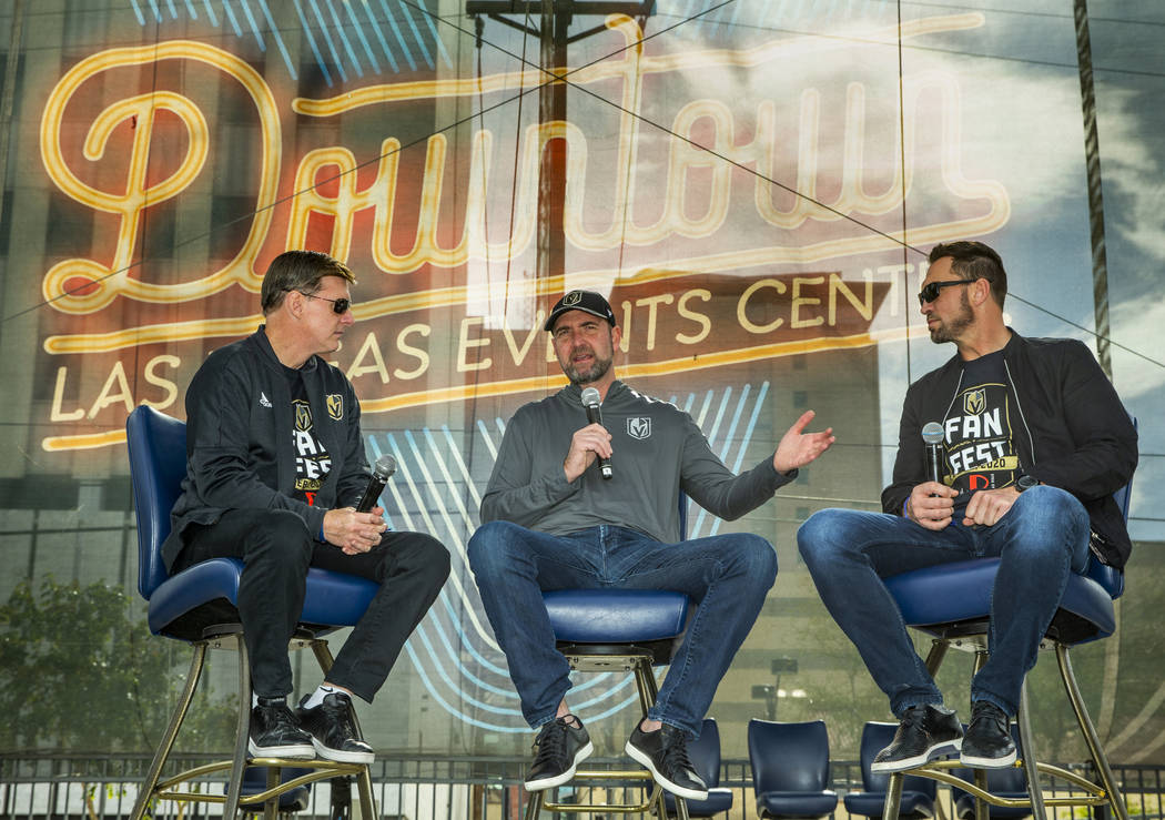 Head coach Peter DeBoer, center, is interviewed by Vegas Golden Knights' sportscasters Dave Gou ...