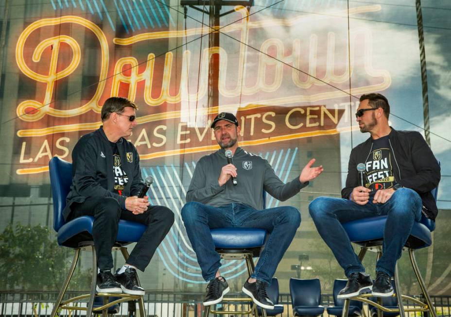 Head coach Peter DeBoer, center, is interviewed by Vegas Golden Knights' sportscasters Dave Gou ...