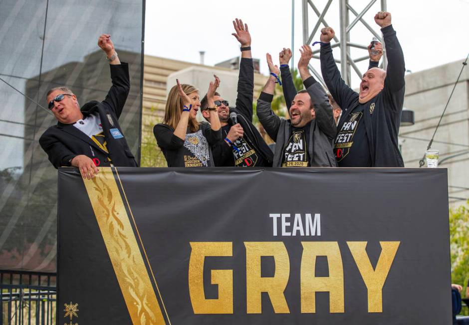 Team Gray celebrates their first round win during a game of Knight Family Feud on stage during ...