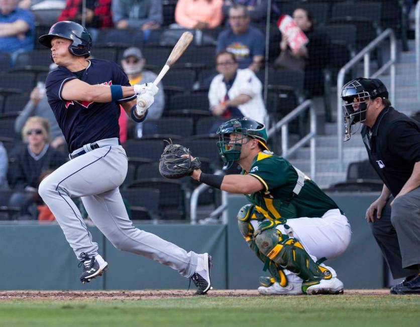 Cleveland Indians outfielder Alex Call (71) singles in a run in the eighth inning during a Majo ...