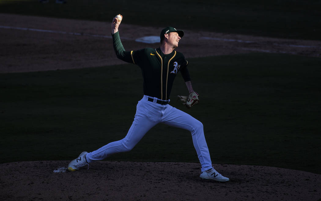 Oakland Athletics pitcher Brian Howard (76) delivers to home plate in the sixth inning during a ...