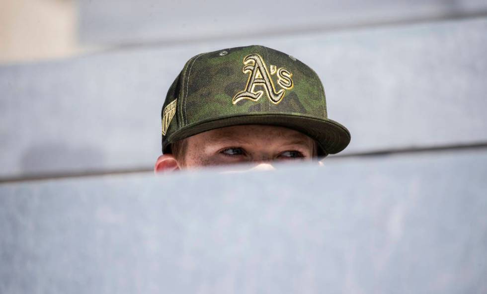 Oakland Athletics fan Ryan Lang, 8, from Pleasanton, Calif., watches a Major League Baseball ga ...