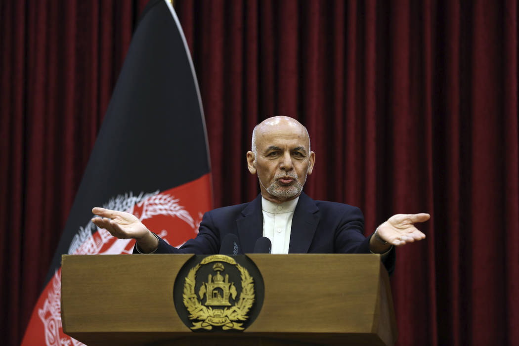 Afghan President Ashraf Ghani speaks during a news conference at the presidential palace in Kab ...