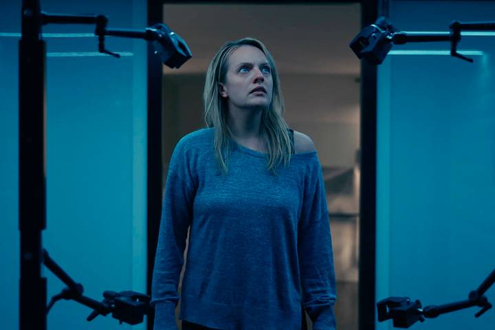 This image released by Universal Pictures shows Elisabeth Moss in a scene from "The Invisi ...