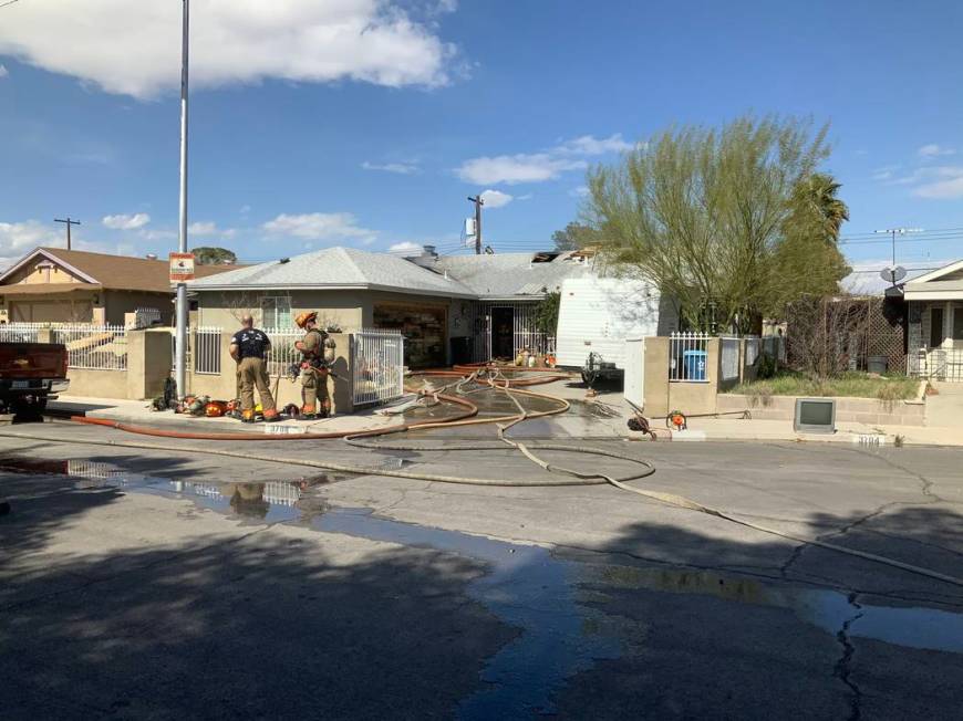 Firefighters battle a two-alarm blaze in the central Las Vegas Valley on Sunday, March, 1, 2020 ...