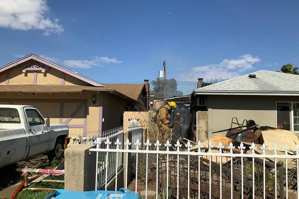 Firefighters battle a two-alarm blaze in the central Las Vegas Valley on Sunday, March, 1, 2020 ...