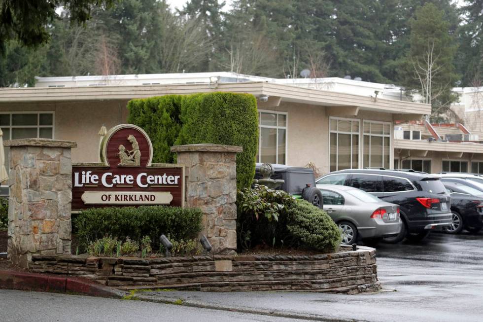 A sign at the entrance of the Life Care Center is show in Kirkland, Wash., near Seattle, Monday ...