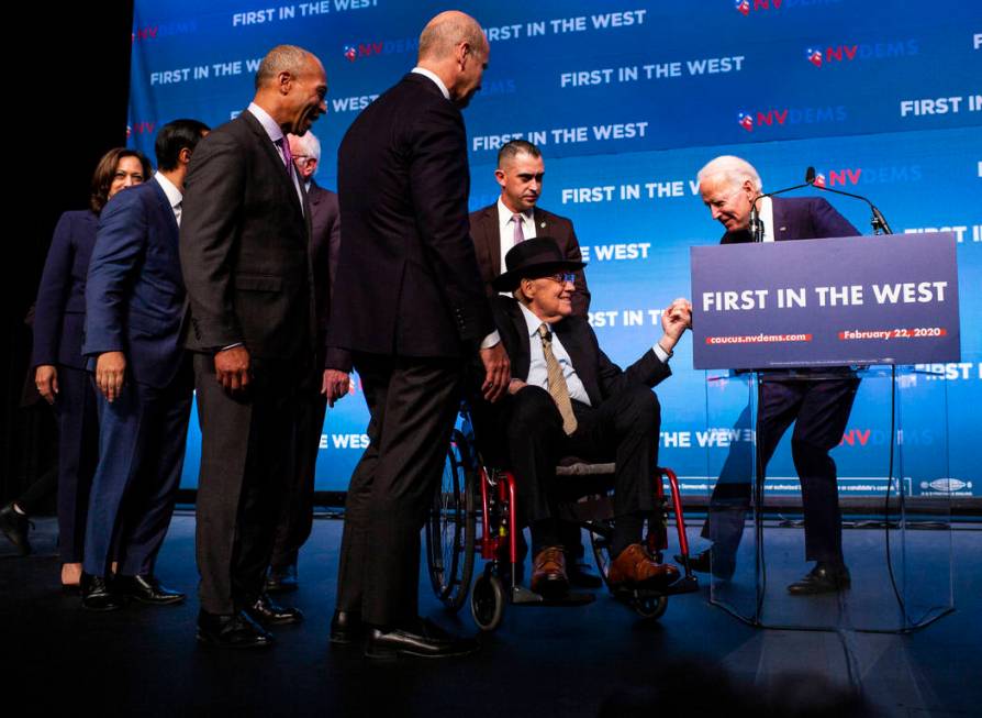 Democratic presidential candidate former Vice President Joe Biden, right, greets U.S. Sen. Harr ...