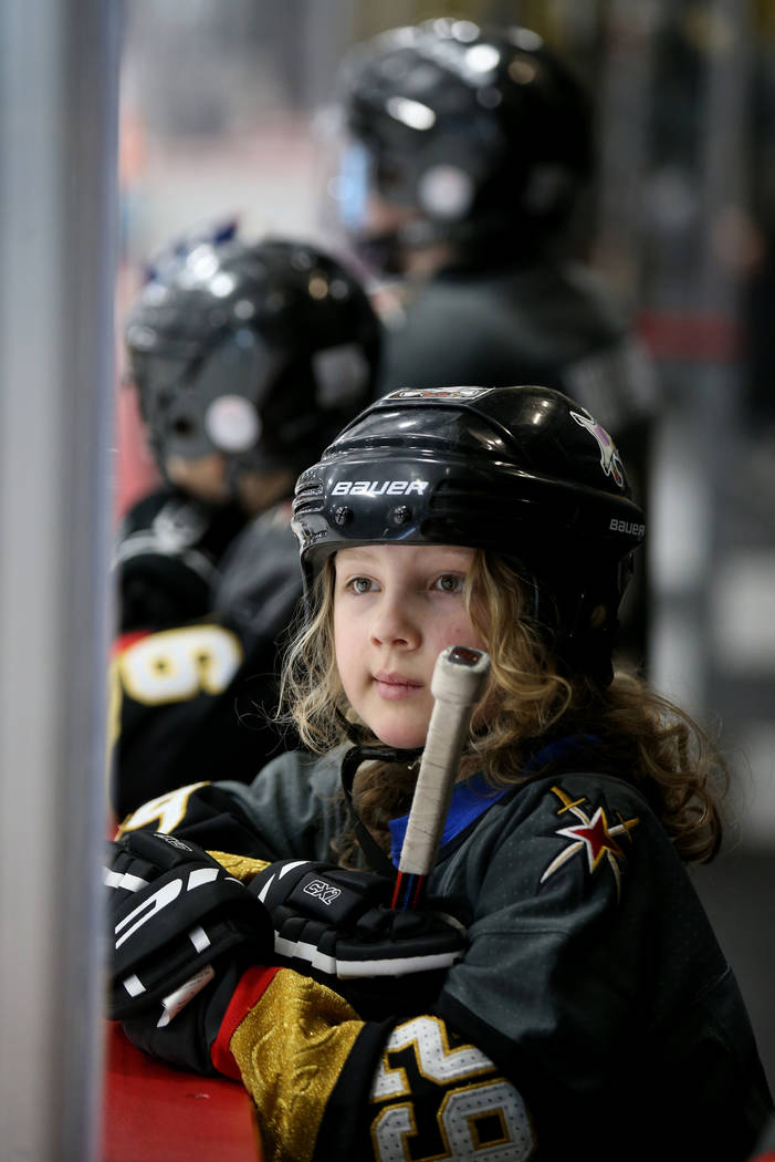 Make-A-Wish kid Roman Runnalls, 10, of Canada watches Vegas Golden Knights players practice at ...