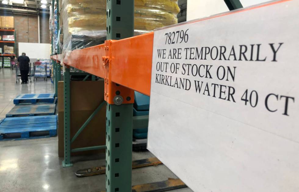 An empty bottled water aisle at a Costco store in Henderson is seen on Monday, March 2, 2020 as ...