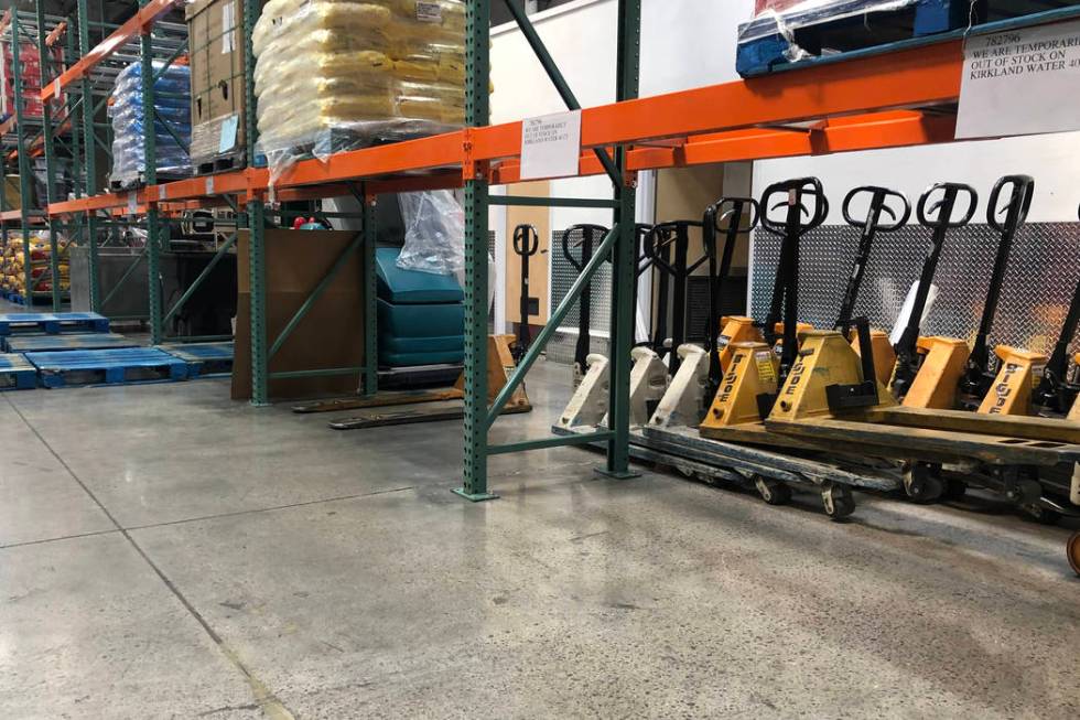 An empty bottled water aisle at a Costco store in Henderson is seen on Monday, March 2, 2020 as ...