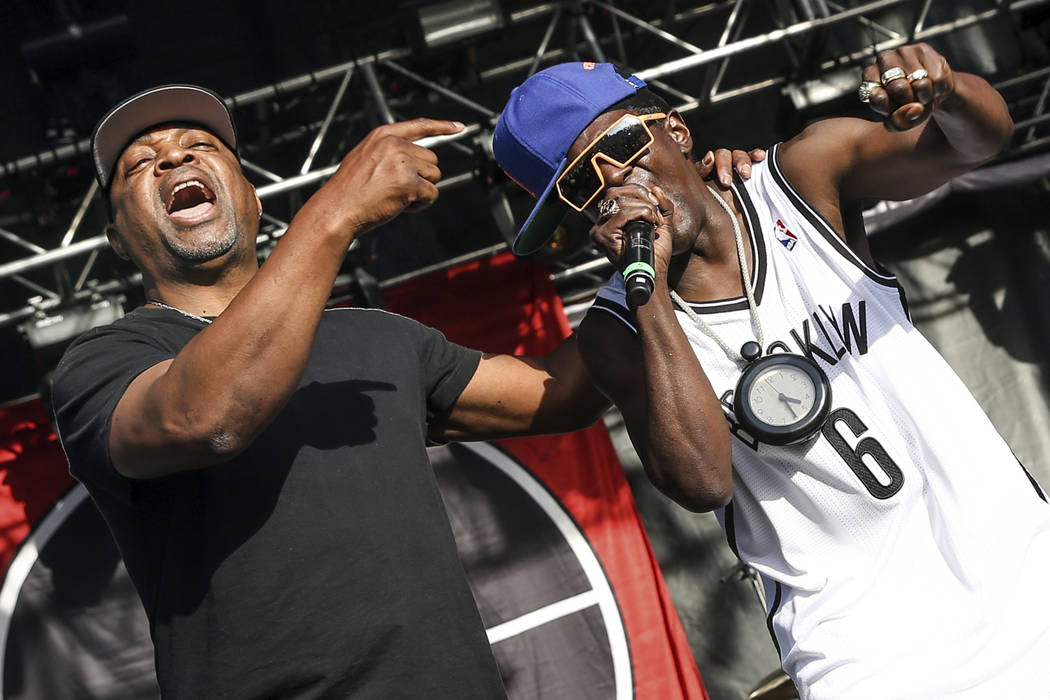 This May 29, 2015 file photo shows Chuck D, left, Flavor Flav of Public Enemy performing at the ...