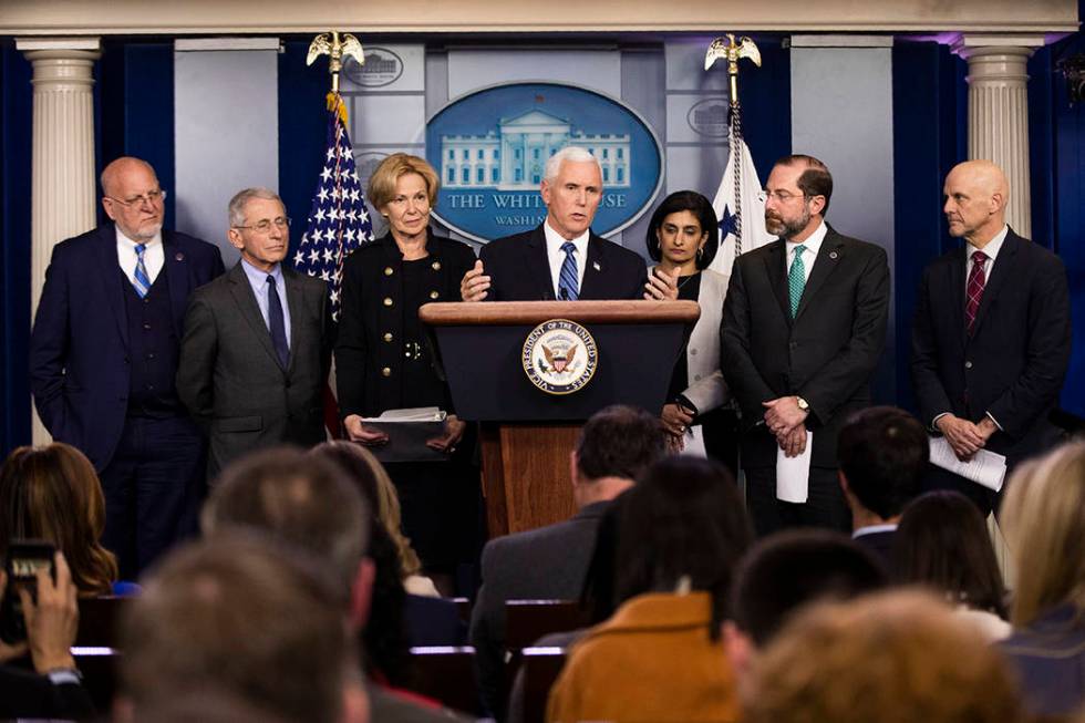 Vice President Mike Pence, center, with, from left, Director of the Centers for Disease Control ...