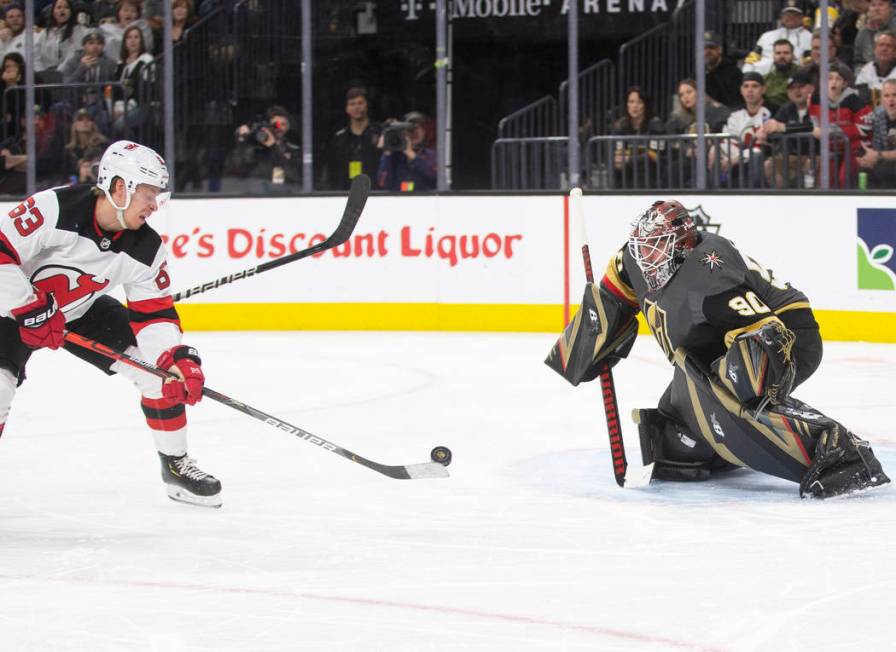 Vegas Golden Knights goaltender Robin Lehner (90) makes a save against New Jersey Devils left w ...