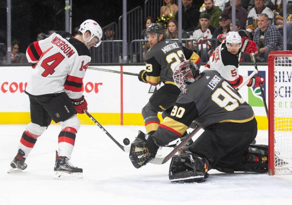 Vegas Golden Knights goaltender Robin Lehner (90) makes a save against New Jersey Devils right ...