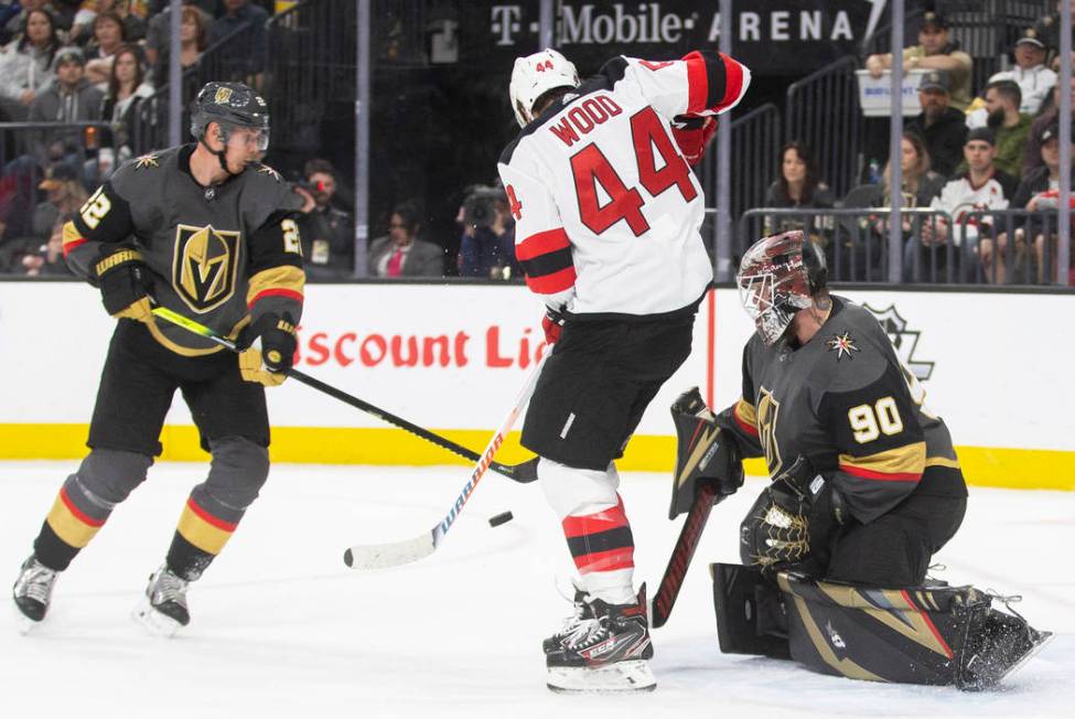 Vegas Golden Knights goaltender Robin Lehner (90) makes a save against New Jersey Devils left w ...