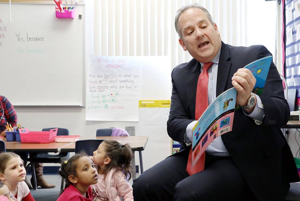 Clark County School District superintendent Dr. Jesus Jara reads to a kindergarten class for r ...