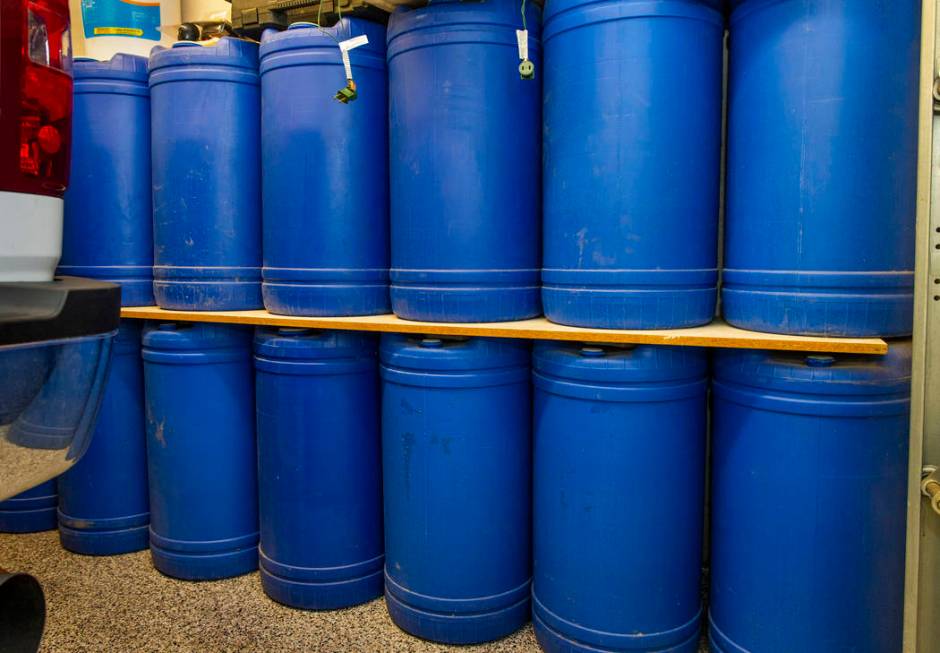 Barrels of water stored in the home garage of Cory and Holly Steed on Monday, March 2, 2020 in ...