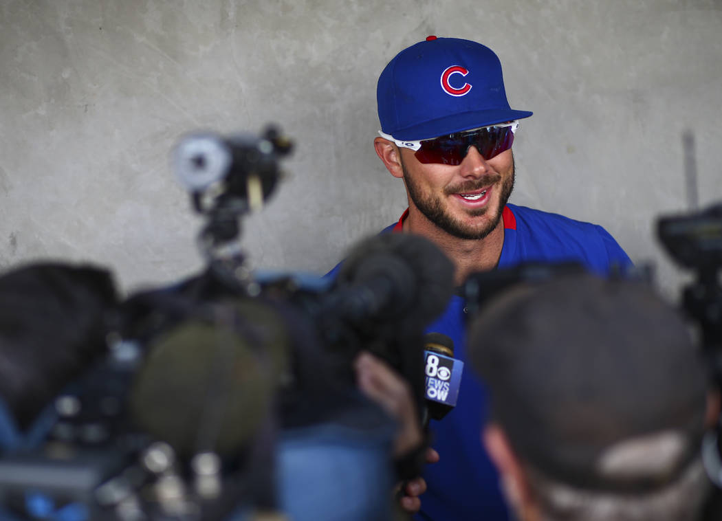 Chicago Cubs' Kris Bryant speaks with the media before a baseball game against the Cincinnati R ...