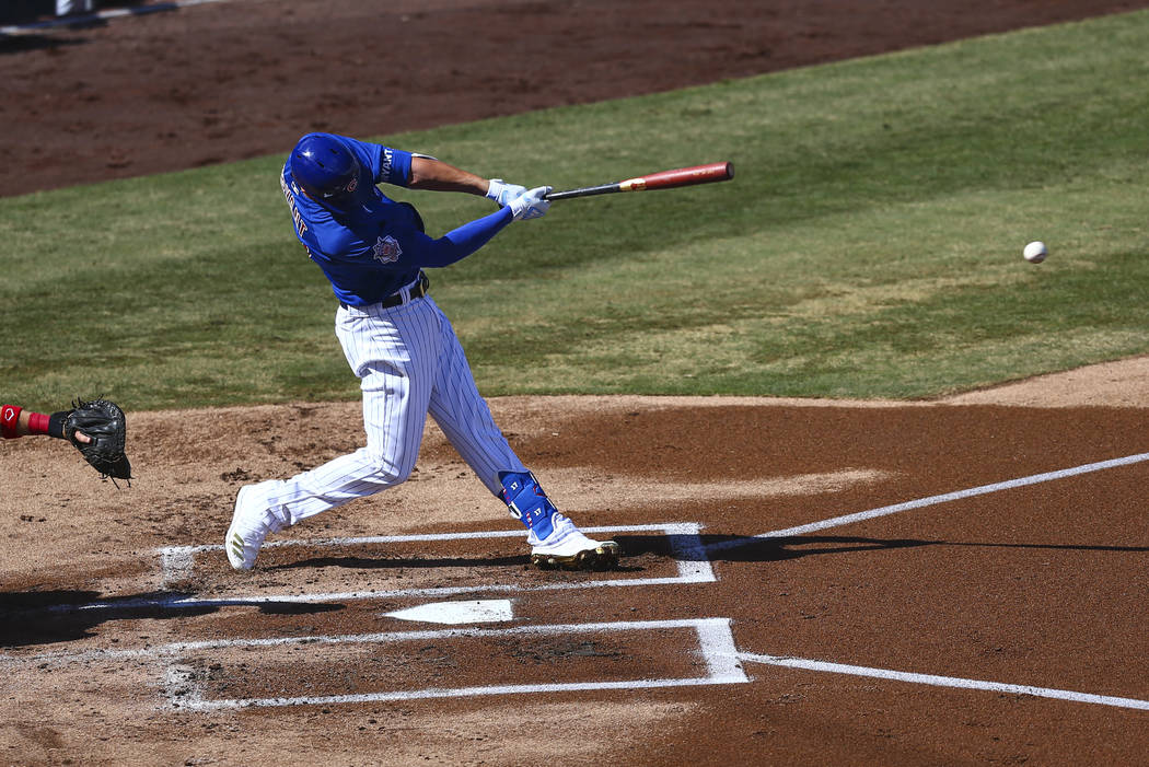 Chicago Cubs' Kris Bryant hits the ball during the first inning of a Big League Weekend basebal ...