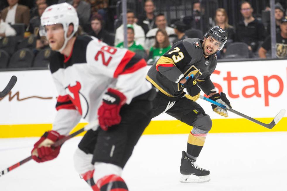 Vegas Golden Knights center Brandon Pirri (73) skates up ice past New Jersey Devils defenseman ...