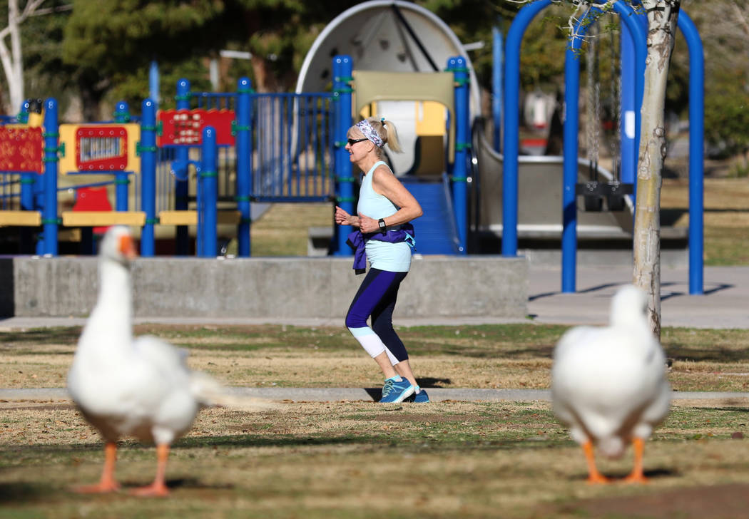 A woman jogs at Sunset Park during a sunny morning on Wednesday, March 4, 2020, in Las Vegas. ( ...