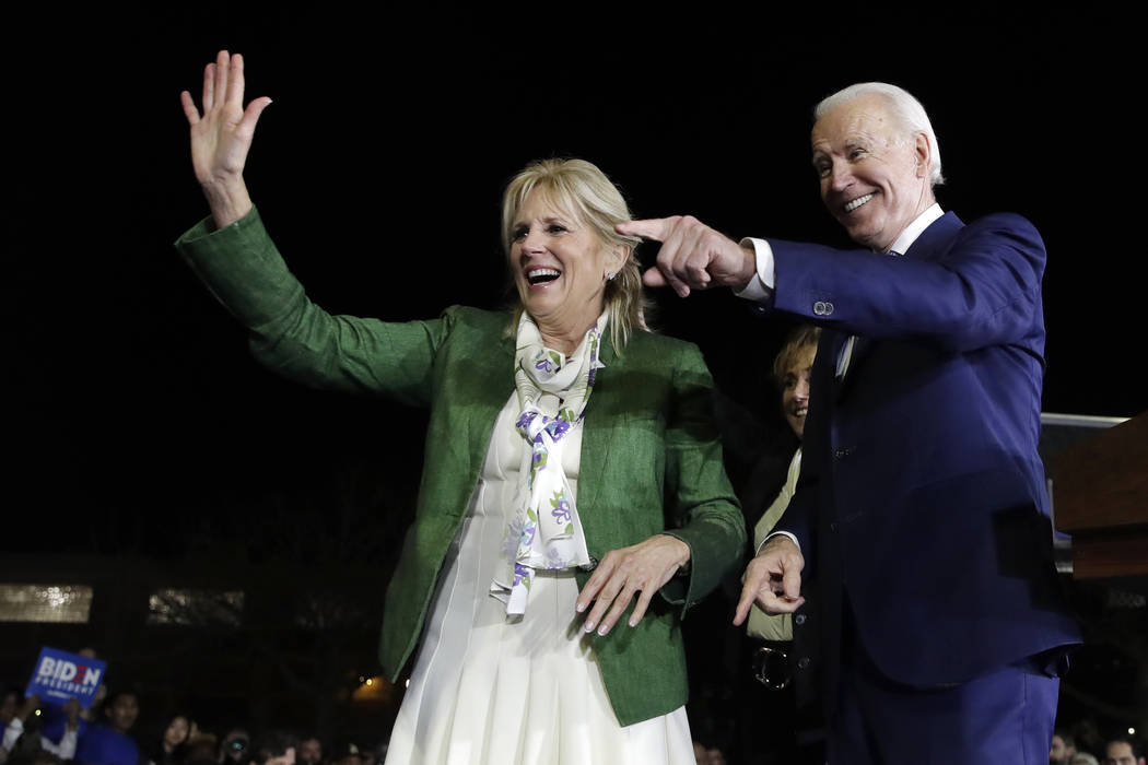 Democratic presidential candidate former Vice President Joe Biden, right, and his wife Jill att ...