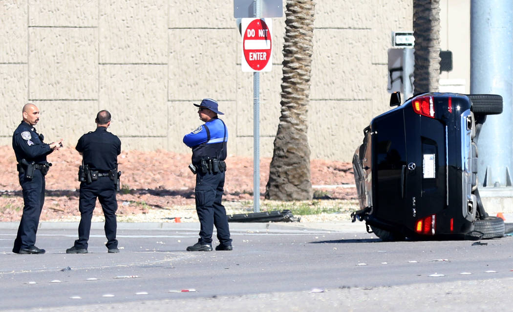 North Las Vegas police investigate a police shooting near Lamb Boulevard and Interstate 15 on W ...
