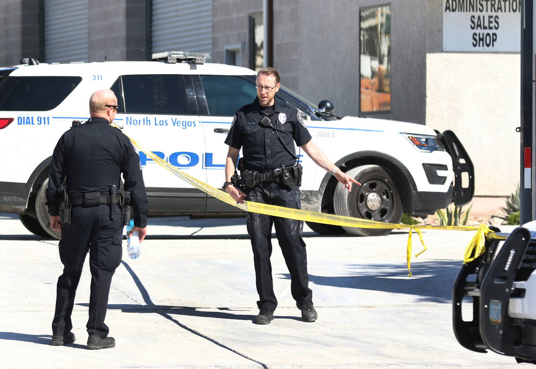 North Las Vegas police investigate a police shooting near Lamb Boulevard and Interstate 15 on W ...