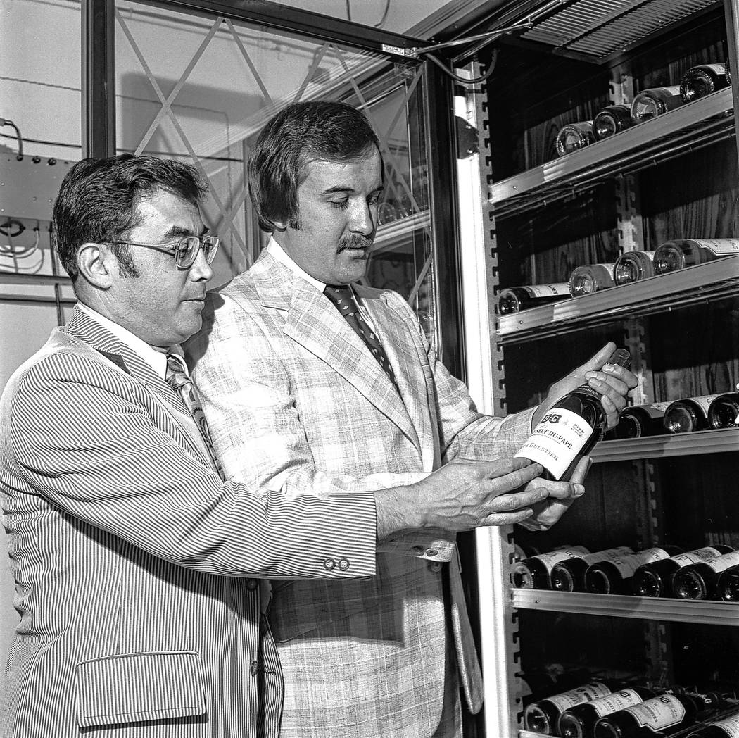 Jerry Vallen and Larry Ruvo examine a bottle of wine in 1974. Their efforts yielded UNLVino, wh ...