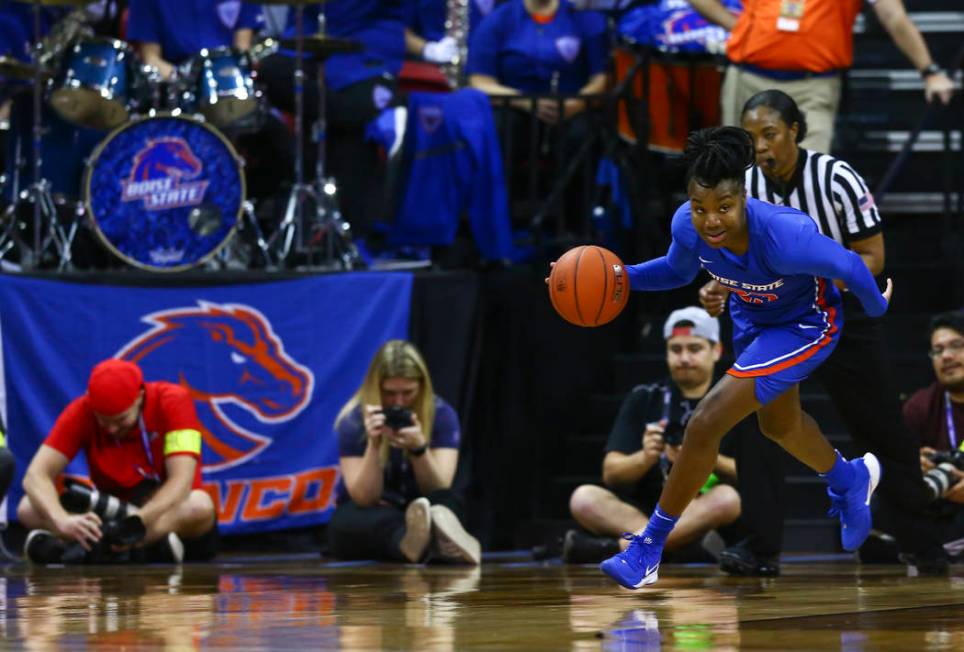 Boise State Broncos' Jayde Christopher (23) brings the ball up court during the first half of t ...