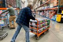 Shoppers visit a Costco Wholesale in Las Vegas on Monday, March 2, 2020. (David Guzman/Las Vega ...