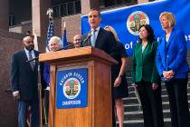 Los Angeles Mayor Eric Garcetti speaks at a news conference that announced that six new cases o ...