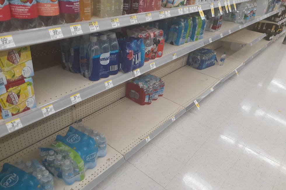 The bottled water aisle at Walgreens, 2389 E. Windmill Lane in Las Vegas. (Tony Garcia/Las Vega ...