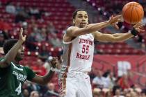 UNLV Rebels guard Elijah Mitrou-Long (55) runs the fast break with Colorado State Rams guard Is ...