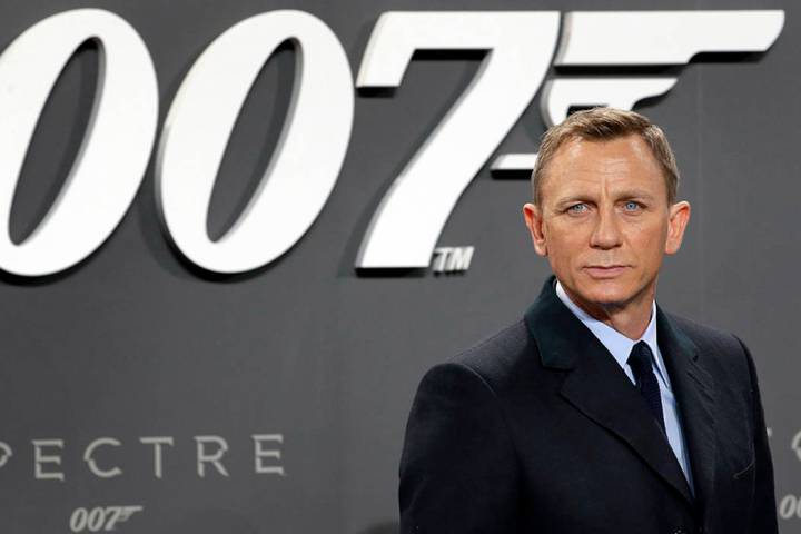 Actor Daniel Craig poses for the media as he arrives for the German premiere of the James Bond ...