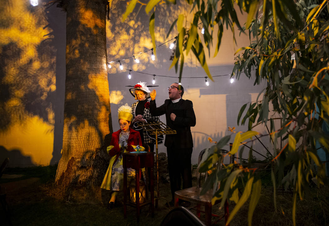 Rev. Dolor, played by Mike Vargovich, right, speaks alongside Pansy Stock, played by Rose Donah ...