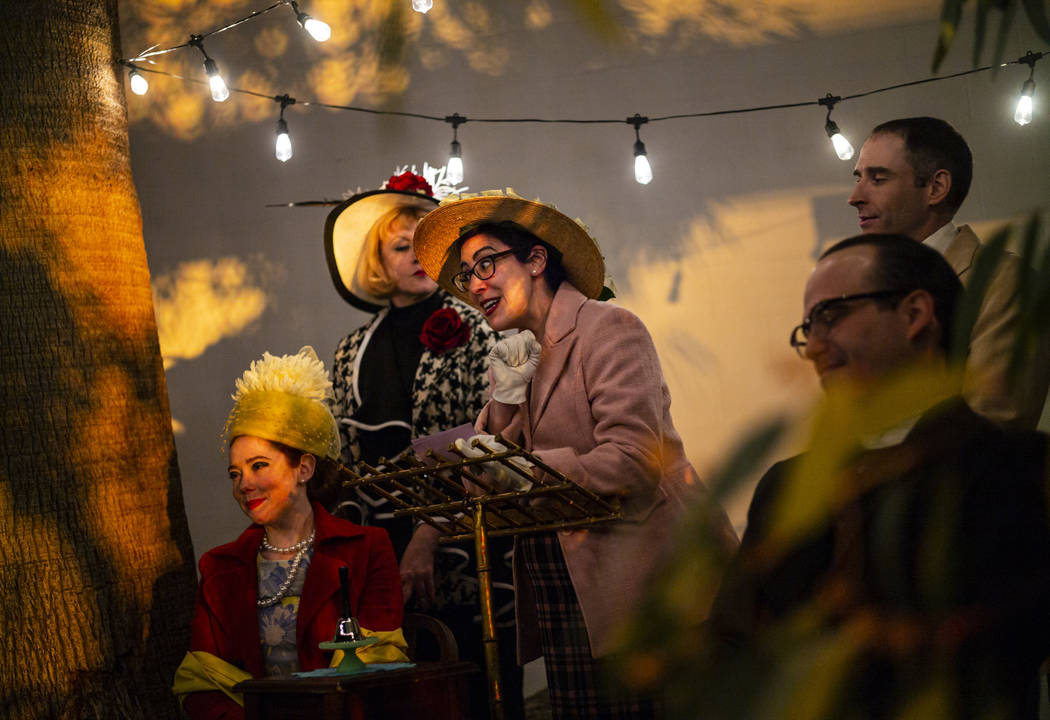 Iris Larkspur, played by Sarah Adams, center, speaks alongside, from left, Pansy Stock, played ...