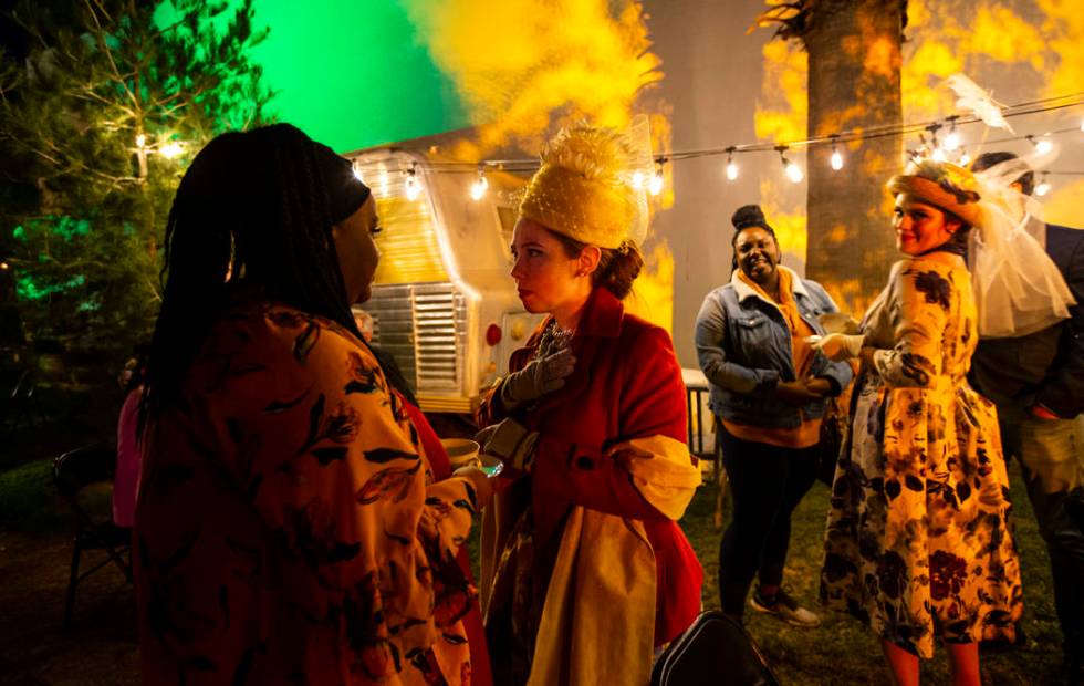 Pansy Stock, played by Rose Donahue, right, interacts with attendee Whitley Wilburn during a dr ...